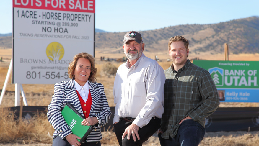 Bank of Utah's Kelly Crane-Hale meets with developers Howard and Garrett Schmidt at Eagle Mountain's Browns-Meadows subdivision