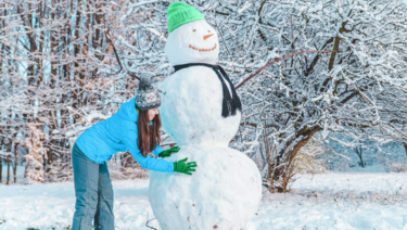 woman builds giant snowman